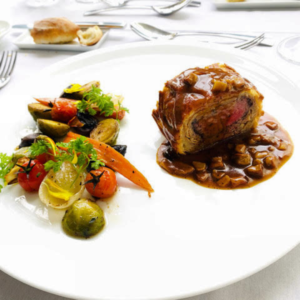 Beef Tenderloin Wellington, Glazed Vegetables and Perigueux Sauce