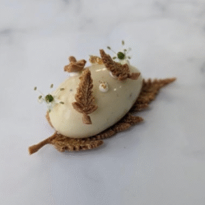 Comté Cheese Crémeux, Truffle Pearls and Cauliflower Salsa Quenelle