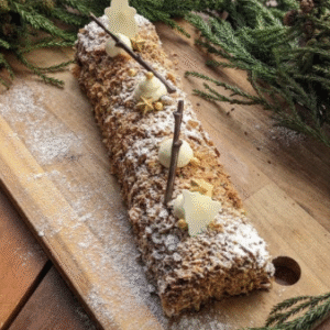 Ice cream buche - Our famous Mystery Bûche  Vanilla parfait ice cream, heart of meringue and crispy praline (size for 6 pax)